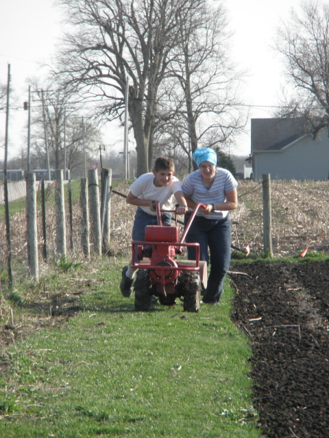 Teamwork on the farm and tiller. 