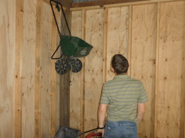 Tim searching for Easter eggs in the barn.  